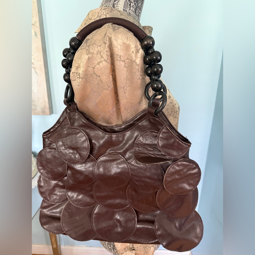 Sleek Brown Leather Shoulder Bag with Adjustable Strap and Accents